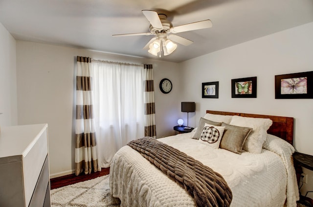 32290 US-71, Menahga, MN 56464 - bedroom featuring wood finished floors, a ceiling fan, and baseboards