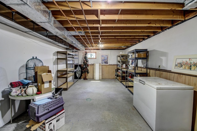 32290 US-71, Menahga, MN 56464 - basement with white refrigerator, wainscoting, and wooden walls