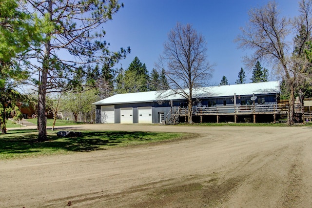 32290 US-71, Menahga, MN 56464 - view of property featuring dirt driveway and a detached garage