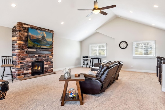 living room with a ceiling fan, baseboards, carpet, and vaulted ceiling