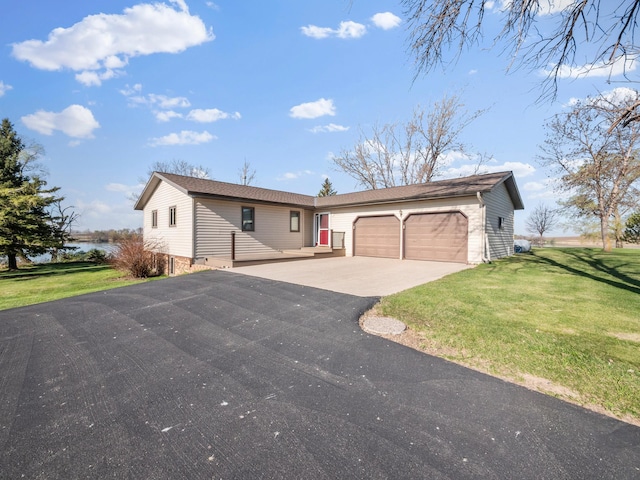 19447 County Road 1, Morris, MN 56267 - ranch-style home featuring asphalt driveway, a garage, and a front yard