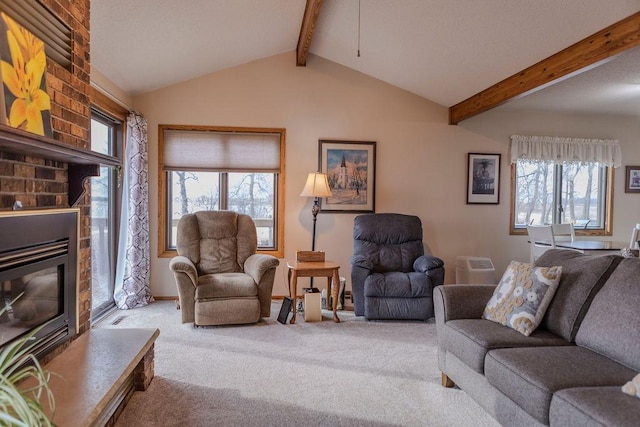 19447 County Road 1, Morris, MN 56267 - carpeted living area with a brick fireplace, a healthy amount of sunlight, and vaulted ceiling with beams