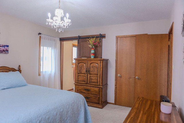 19447 County Road 1, Morris, MN 56267 - bedroom featuring carpet floors, a chandelier, baseboards, and a barn door