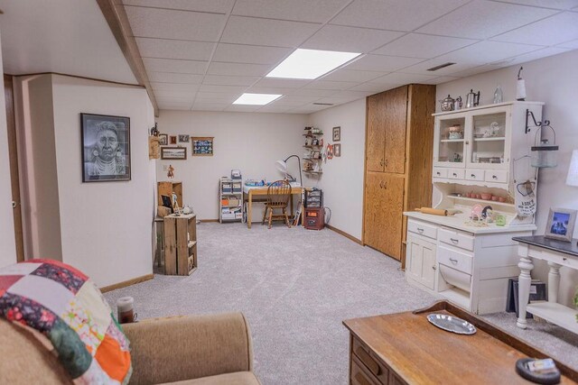 19447 County Road 1, Morris, MN 56267 - living room featuring light colored carpet, baseboards, and a paneled ceiling