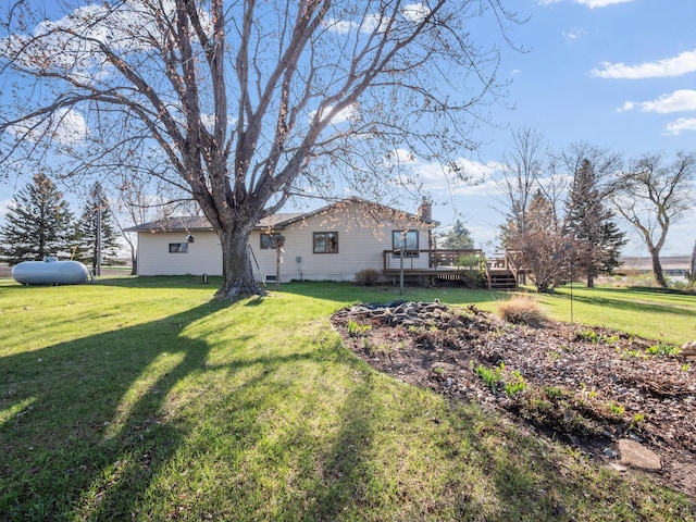 19447 County Road 1, Morris, MN 56267 - view of grassy yard featuring a deck