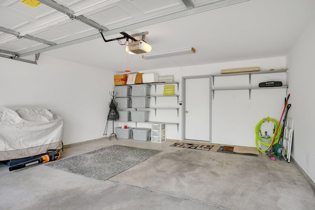 garage featuring a garage door opener