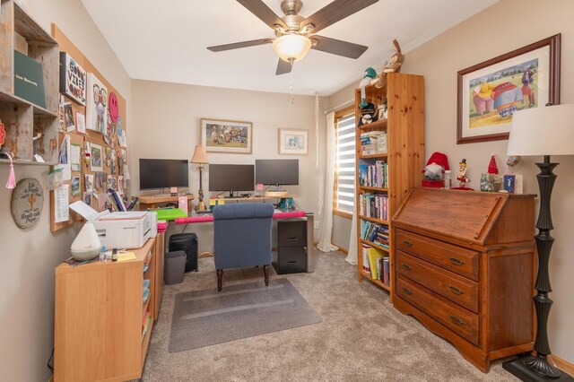office with ceiling fan and light colored carpet