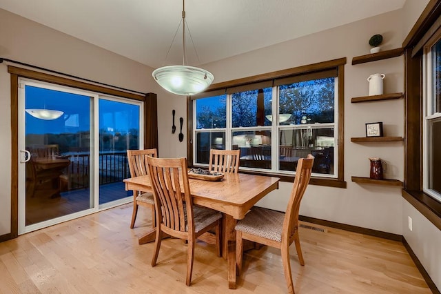 334 143rd Ave NW, Andover, MN 55304 - dining area featuring light wood finished floors and baseboards