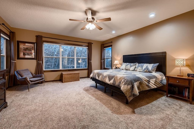 334 143rd Ave NW, Andover, MN 55304 - carpeted bedroom with recessed lighting, ceiling fan, baseboards, and a textured ceiling