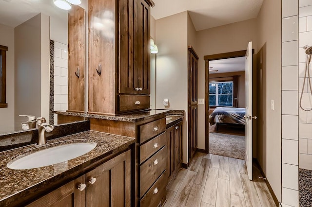 334 143rd Ave NW, Andover, MN 55304 - ensuite bathroom with wood finished floors and vanity