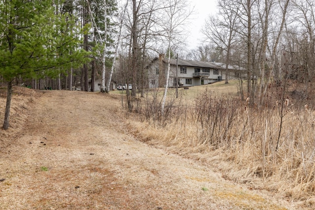 view of road with driveway