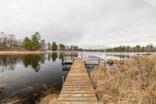 view of dock featuring a water view and boat lift