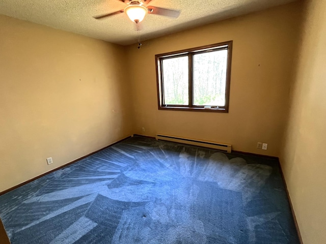 carpeted spare room featuring a baseboard heating unit, a textured ceiling, a ceiling fan, and baseboards