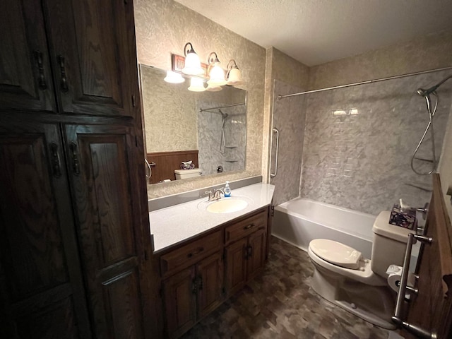 full bath with toilet, a textured ceiling,  shower combination, vanity, and a chandelier