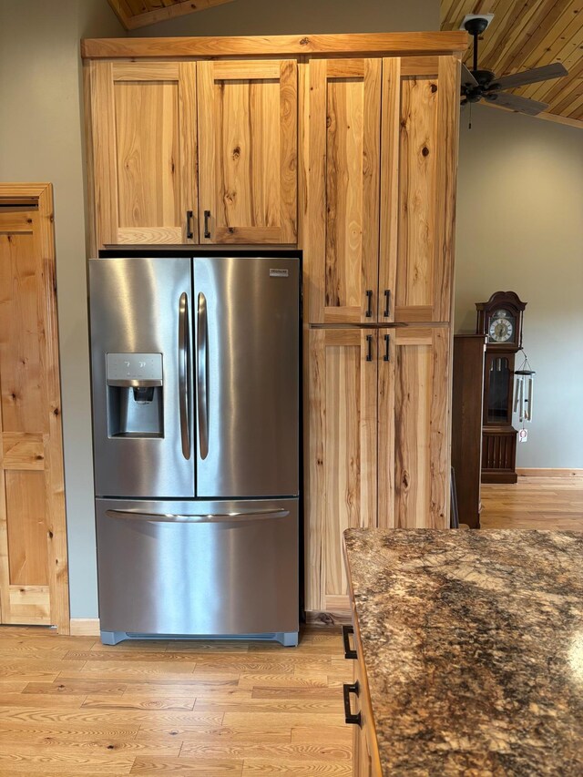 1008 Ruby St NW, Alexandria, MN 56308 - kitchen featuring stainless steel fridge, a ceiling fan, light wood-type flooring, baseboards, and lofted ceiling