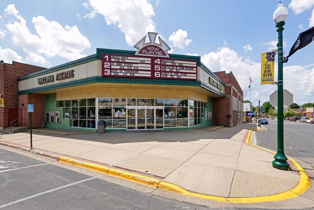 view of property featuring uncovered parking