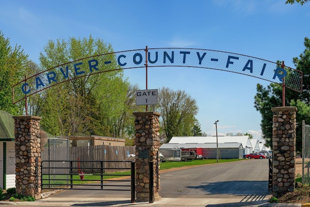 view of gate featuring fence