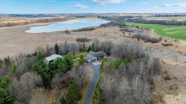 aerial view with a rural view and a water view
