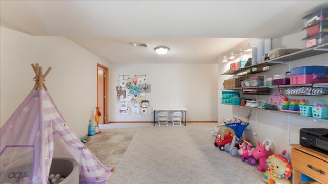 game room with carpet flooring and baseboards