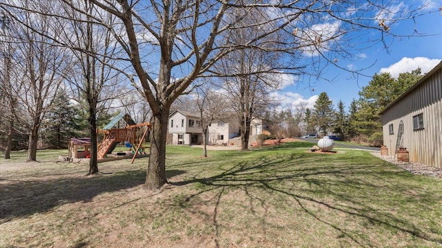 view of yard featuring playground community