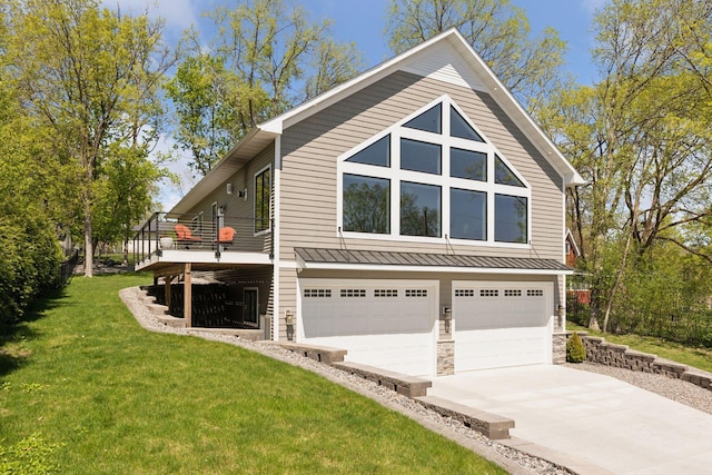 1929 Fagerness Point Rd, Orono, MN 55391 - view of side of property with an attached garage, a standing seam roof, driveway, a lawn, and metal roof