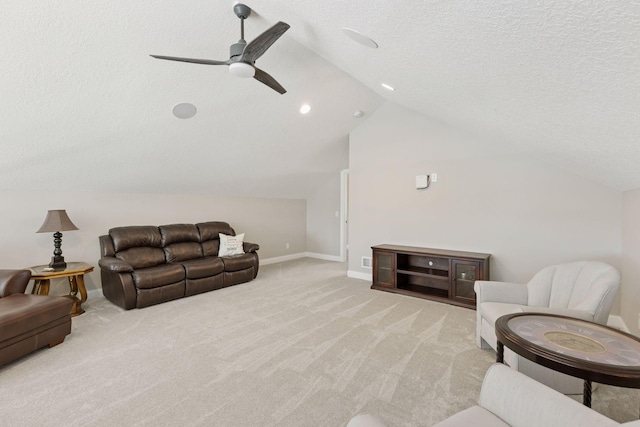 1929 Fagerness Point Rd, Orono, MN 55391 - living area featuring vaulted ceiling, light carpet, a ceiling fan, a textured ceiling, and baseboards