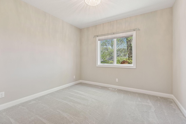 1929 Fagerness Point Rd, Orono, MN 55391 - carpeted empty room with baseboards