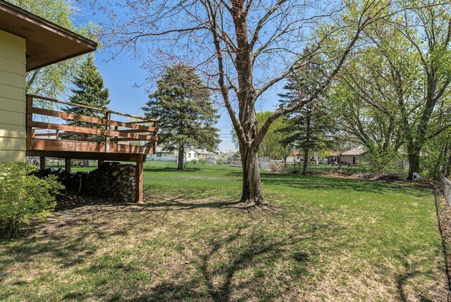 view of yard with a wooden deck