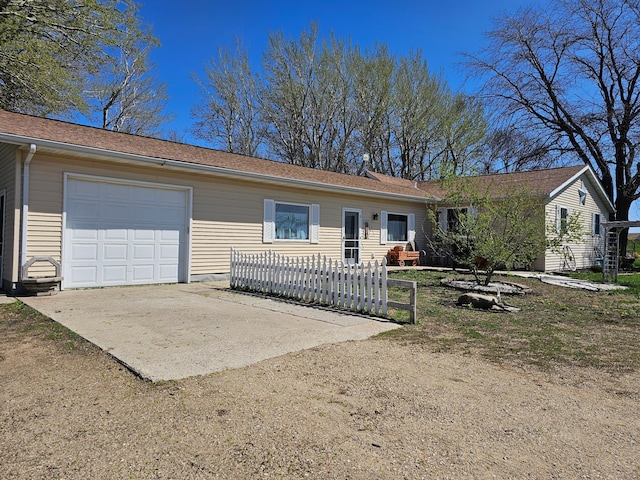 12405 State Highway 91, Leota Twp, MN 56155 - ranch-style home with concrete driveway and an attached garage
