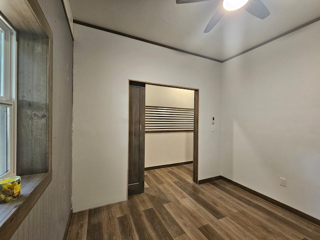 12405 State Highway 91, Leota Twp, MN 56155 - unfurnished room with dark wood-style floors and a ceiling fan
