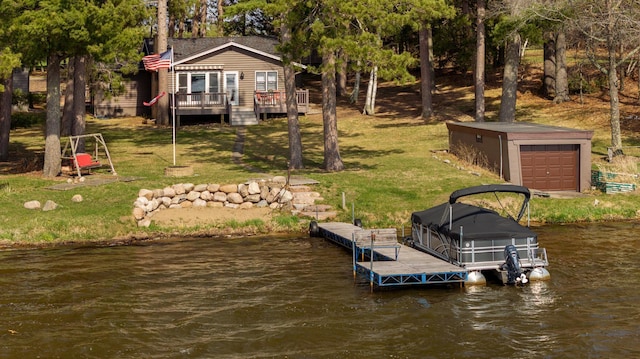 dock with a yard and a deck with water view