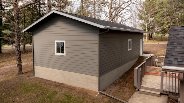 view of home's exterior featuring a deck