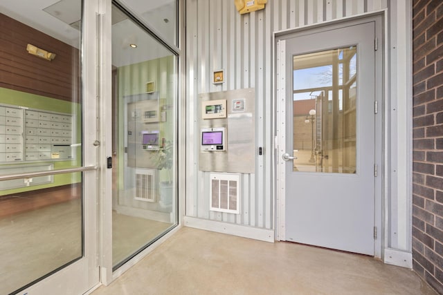 view of exterior entry with visible vents