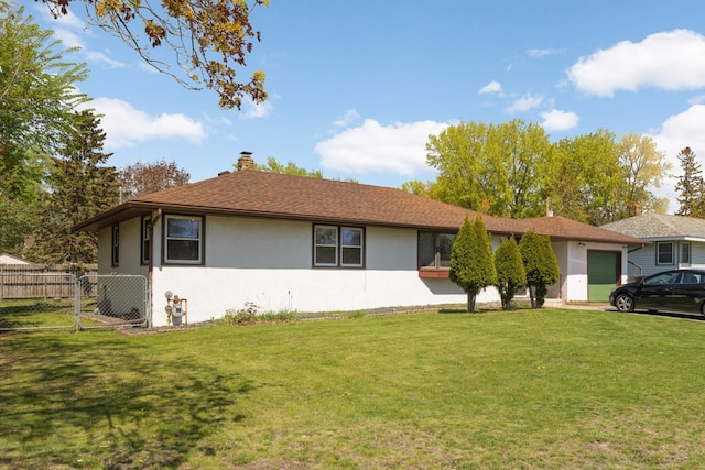 single story home featuring stucco siding, an attached garage, and a chimney