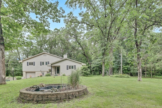 73466 318th Ave, Lake City, MN 55041 - view of green lawn featuring a garage