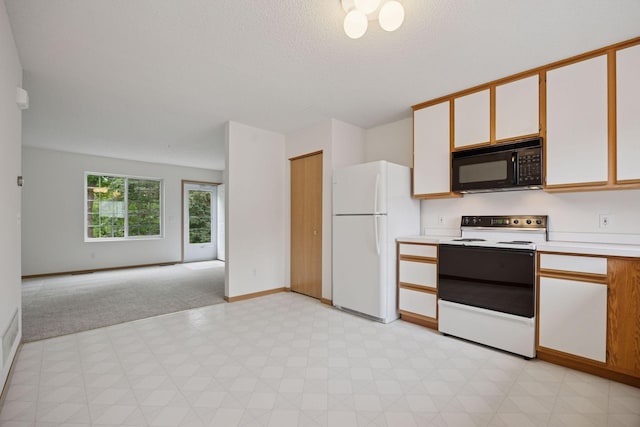 9110 Terra Verde Trl, Eden Prairie, MN 55347 - kitchen with white appliances, light flooring, light countertops, baseboards, and open floor plan