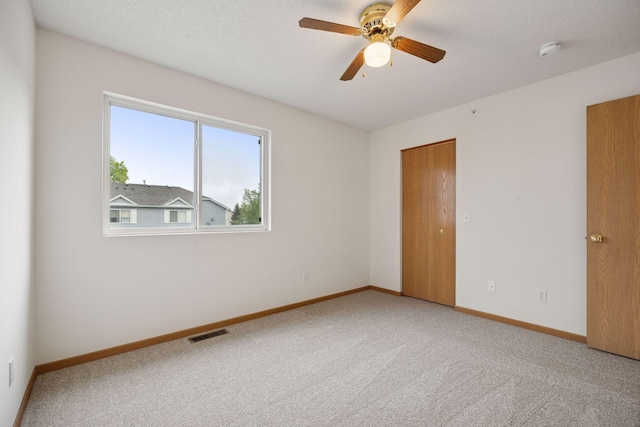 9110 Terra Verde Trl, Eden Prairie, MN 55347 - unfurnished bedroom with carpet floors, baseboards, and ceiling fan