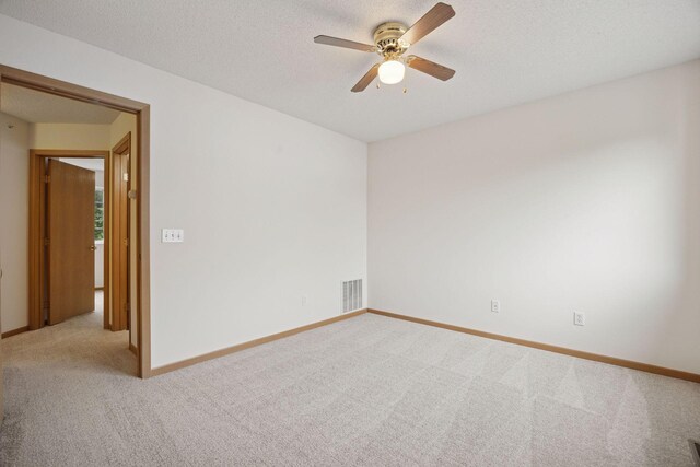 9110 Terra Verde Trl, Eden Prairie, MN 55347 - carpeted spare room with ceiling fan and baseboards