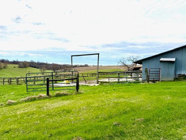 15497 Meiners Rd, Mayville Twp, MN 55921 - view of yard with a rural view, an outbuilding, and an exterior structure