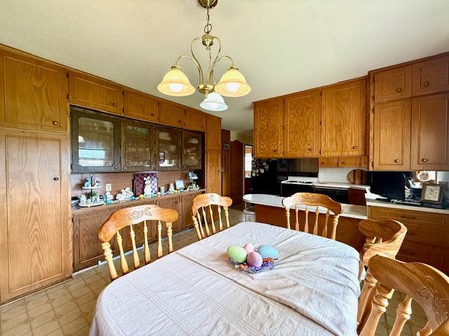 15497 Meiners Rd, Mayville Twp, MN 55921 - dining room with a chandelier