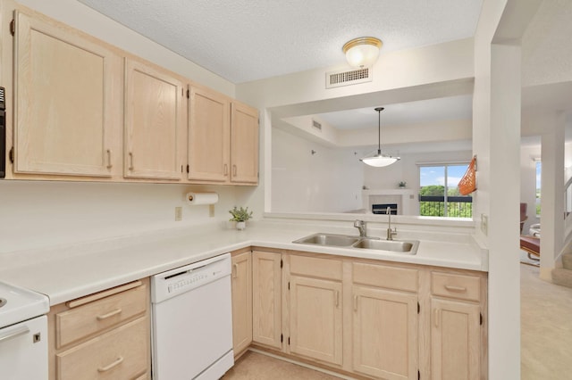 7540 Edinborough Way Unit 1319, Edina, MN 55435 - kitchen with light brown cabinetry, white appliances, a sink, light countertops, and a textured ceiling