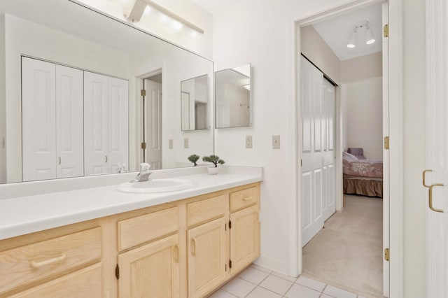 7540 Edinborough Way Unit 1319, Edina, MN 55435 - full bath featuring vanity, tile patterned floors, ensuite bath, and baseboards