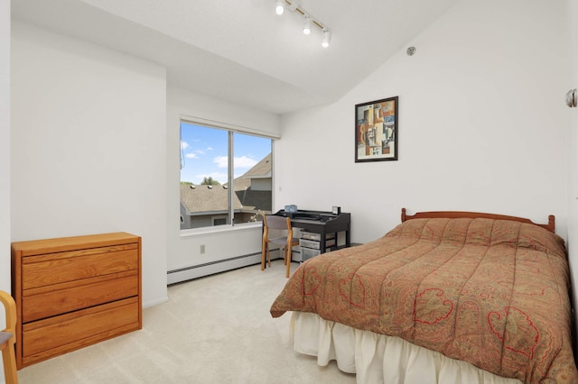 7540 Edinborough Way Unit 1319, Edina, MN 55435 - bedroom featuring a baseboard heating unit, lofted ceiling, track lighting, and carpet