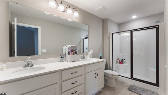full bathroom with double vanity, a sink, tile patterned floors, and a shower stall