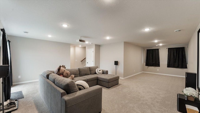 living area featuring light colored carpet, a textured ceiling, stairs, recessed lighting, and baseboards