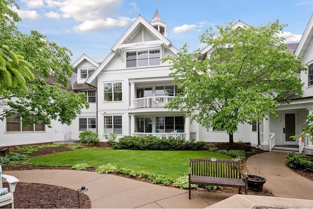 205 Mill St Unit S301, Excelsior, MN 55331 - back of house with a lawn