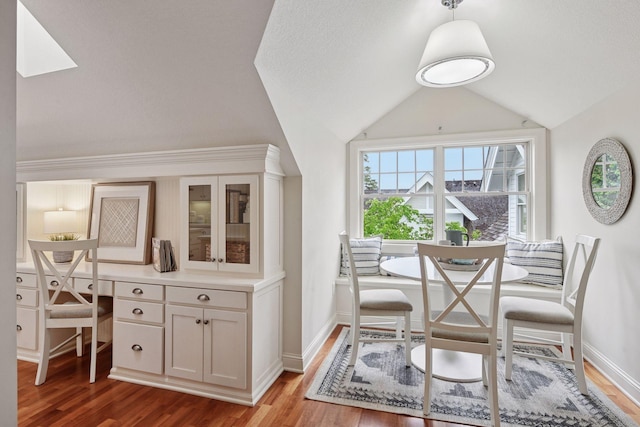 205 Mill St Unit S301, Excelsior, MN 55331 - dining area with wood finished floors, lofted ceiling, and baseboards