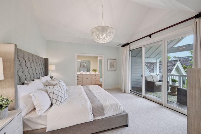 205 Mill St Unit S301, Excelsior, MN 55331 - bedroom with access to exterior, a chandelier, light colored carpet, ensuite bath, and vaulted ceiling