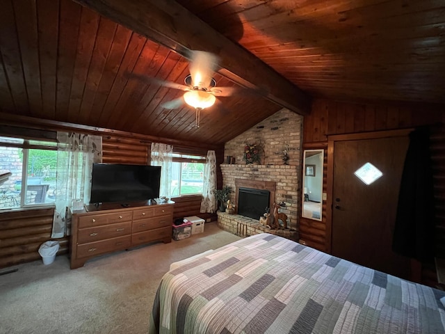 bedroom featuring wood ceiling, a brick fireplace, carpet floors, and ceiling fan