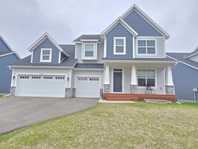 2505 Jaber Ave NE, Saint Michael, MN 55376 - craftsman house with driveway, stone siding, covered porch, and a front yard